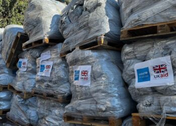 Bales of donated tents stacked in Gaza during the Gaza ceasefire
