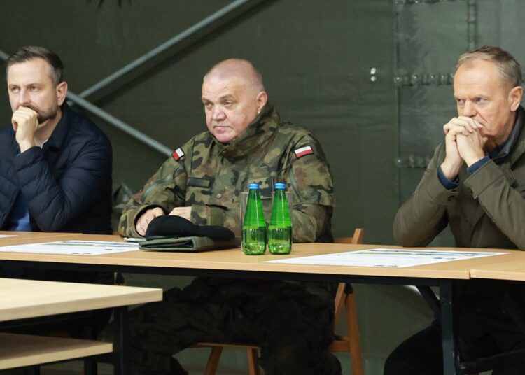 Donald Tusk, right, and Defense Minister Wladyslaw Kosiniak-Kamysz, left, at a briefing in Poland