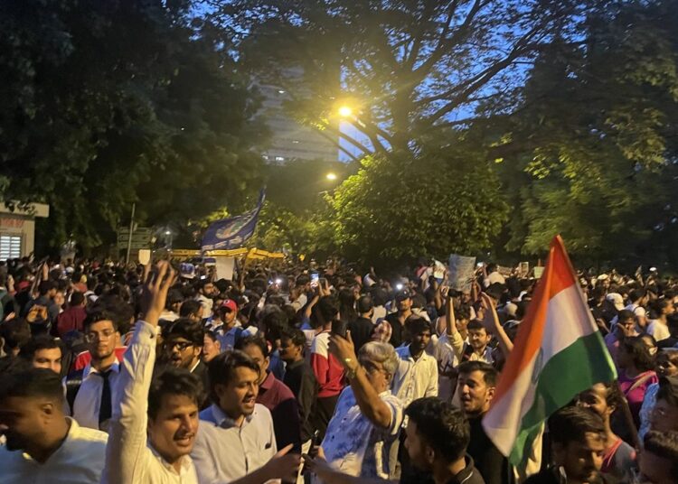 Young protesters with an Indian flag at Jantar Mantar, the usual site of Cockroach Janta Party rallies in New Delhi