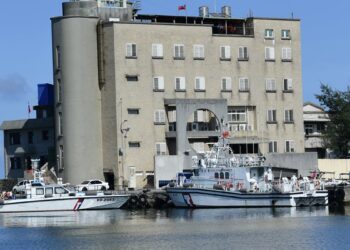 Taiwan coast guard patrol boats docked at a harbor station