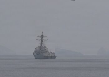 US Navy destroyer on a mine clearance mission in the Strait of Hormuz, where Iran says a supertanker hit a mine