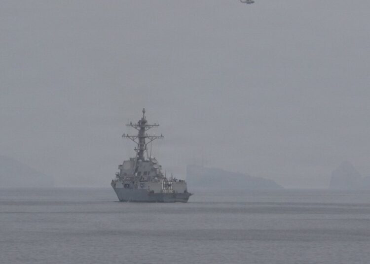 US Navy destroyer on a mine clearance mission in the Strait of Hormuz, where Iran says a supertanker hit a mine