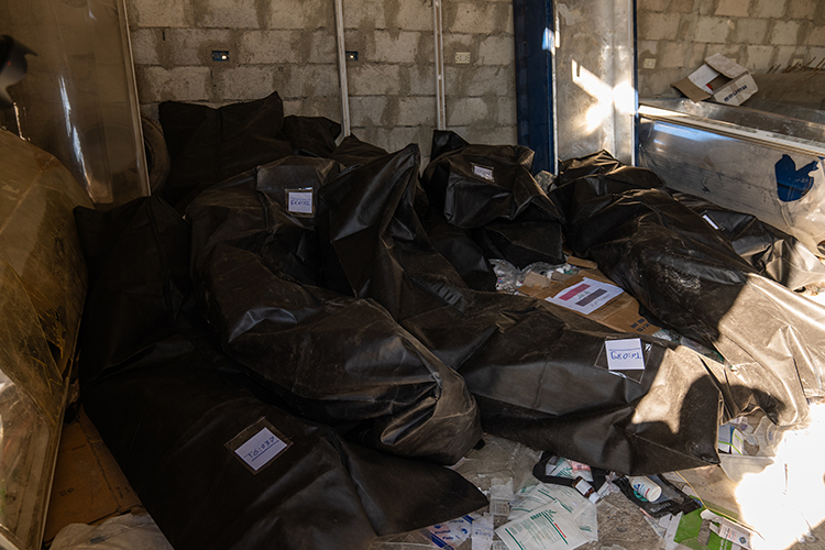 Suriye'nin başkenti Şam'da ilaç deposunda çok sayıda ceset kalıntısı bulundu